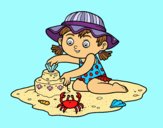 Une jeune fille jouant sur la plage